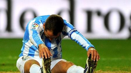 Imágenes del encuentro entre Osasuna y Málaga, disputado este domingo en el estadio de la Rosaleda.