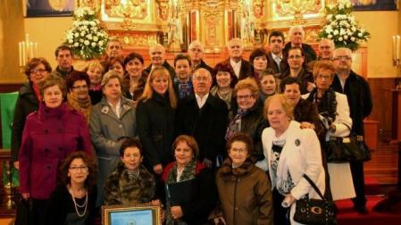 Coro y auroros de Funes, con el cuadro regalo a las Hermanas de la Caridad. 	ALBERTO GALDONA