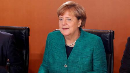 Merkel empieza con optimismo las negociaciones para formar Gobierno
