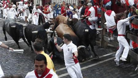 Imágenes del octavo encierro de los Sanfermines de 2018, con toros de la ganadería Miura.