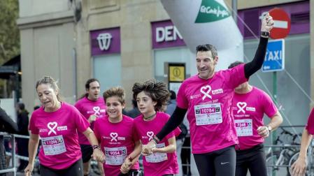 Imágenes de la Carrera contra el cáncer de mama, celebrada este domingo en Pamplona.