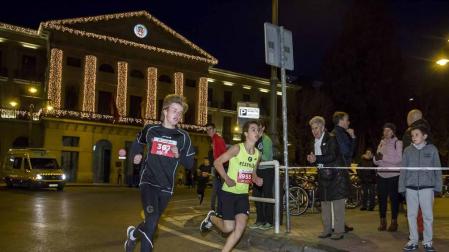 Fotos de la San Silvestre de Pamplona 2019, en la que han participado cerca de 5.000 corredores.