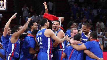 Los jugadores dominicanos celebran su victoria ante Alemania.