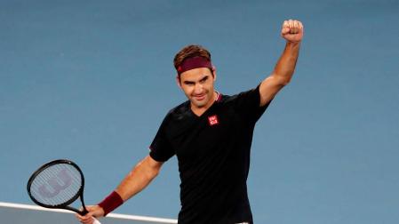 Federer celebra su sufrida victoria ante el australiano John Millman.