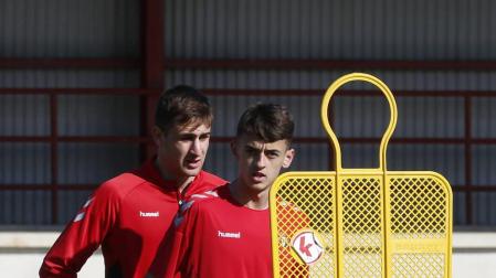 Aimar Oroz (en primer plano) e Iván Martínez 'Barbero', en la sesión de este viernes.