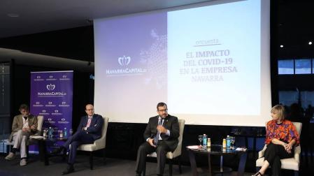 Chechu Rodríguez (CCOO), Carlos Fernández Valdivielso (CEN), Javier Remírez (Gobierno) y Marisol Vicente (UGT), este martes, durante el debate.