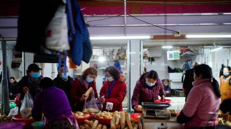 La OMS concluye que el coronavirus procede de Wuhan y es de origen animal