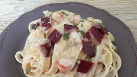 Imagen de la receta de nidos de pasta con gambones y jamón de pato