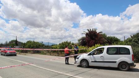 Agentes de Policía, en el lugar del crimen.