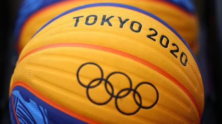 Tokyo 2020 Olympics - Basketball 3x3 Training - Aomi Urban Sports Park, Tokyo, Japan - July 22, 2021 The Olympic rings are seen on a ball during a training session. REUTERS/Andrew Boyers