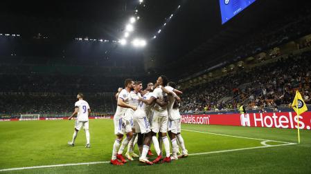 Los jugadores del Real Madrid celebran el tanto de Rodrygo
