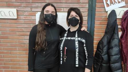 María Nevot junto a su tutora