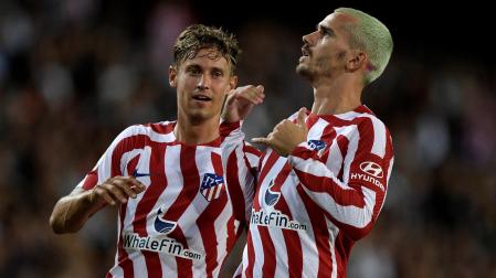 Antoine Griezmann celebra su gol junto a Marcos Llorente