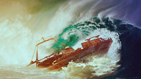 Imagen de un barco llevado por las olas