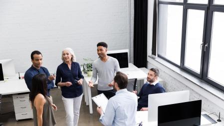 Imagen de un equipo de trabajo reunido.
