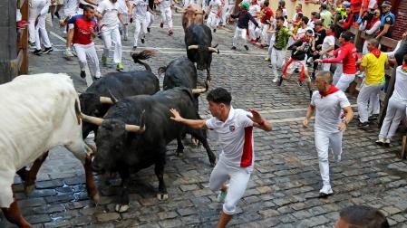 Fotos del sexto encierro de San Fermín 2024 en Pamplona, este viernes 12 de julio.