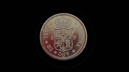 Reverso de una réplica de la moneda de 5 pesetas cuyo original alcanza los 27.000 euros en subasta