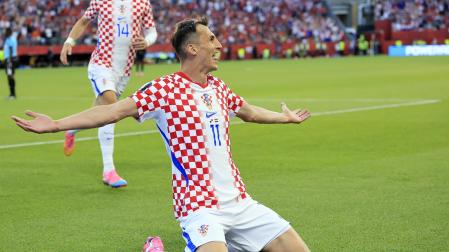 Fotos del debut goleador de Budimir en el Mundial.