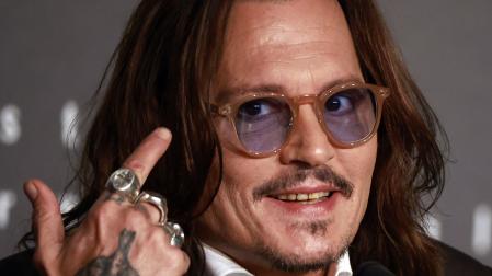 El actor estadounidense Johnny Depp, durante la rueda de prensa que ha ofrecido durante la 76 edición del Festival de Cannes