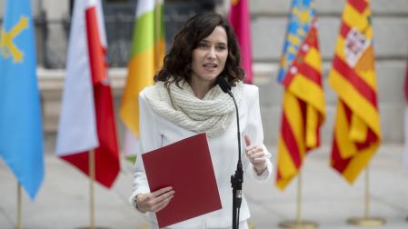 La presidenta de la Comunidad de Madrid, Isabel Díaz Ayuso, tras el acto de izado solemne de la Bandera Nacional con motivo del Día de la Constitución, en el Congreso de los Diputados