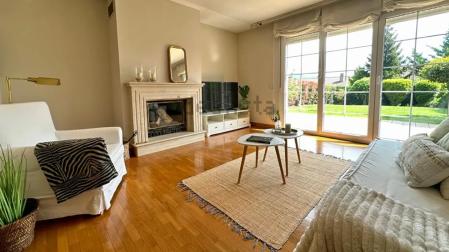 Salón con salida al jardín