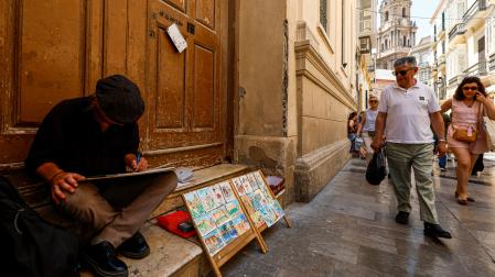 Un pintor callejero en el centro de Málag