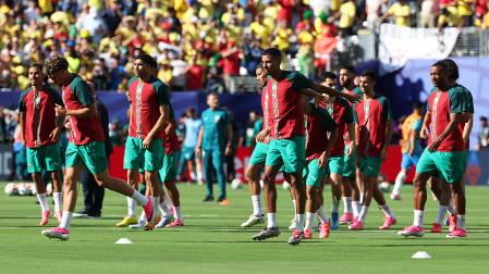 Jugadores de Marruecos calientan antes del partido del grupo C del Mundial de la FIFA 2026 contra Brasil