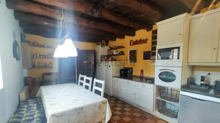 Cocina con vigas a la vista