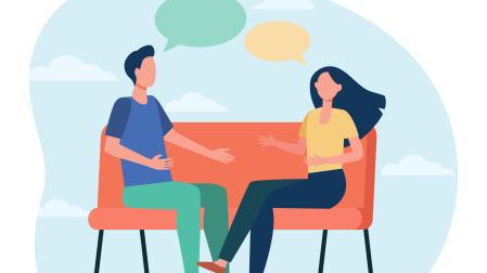 Dos personas manteniendo una conversación