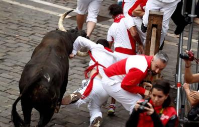 Imágenes del séptimo encierro de los Sanfermines de 2018, con toros de la ganadería Jandilla.