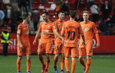 David, junto a sus compañeros, tras la victoria ante el Sporting.