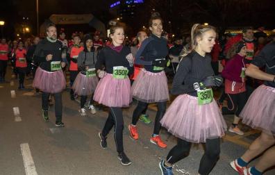 Fotos de la San Silvestre de Pamplona 2019, en la que han participado 5.200 corredores con dorsales.