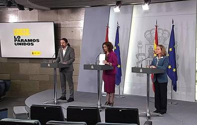 Nadia Calviño, María Jesús Montero y Pablo Iglesias, durante la rueda de prensa.