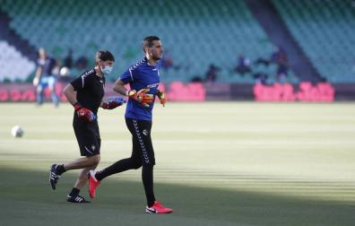 Sanzol y Sergio Herrera, durante el calentamiento.