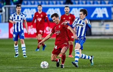 Galería de fotos del partido entre Alavés y Osasuna en Mendizorroza.