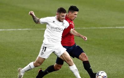 Galería de fotos del partido entre Osasuna y Huesca en El Sadar.