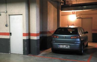 El delito de aparcar en otra plaza
