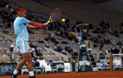 Galería de fotos de la victoria de Rafa Nadal ante Novak Djokovic en Roland Garros. El tenista balear suma su 13º triunfo en París.