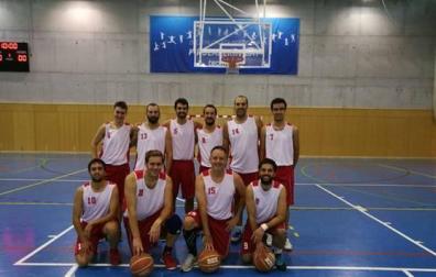 Lamberto, el primero por la derecha en la fila de abajo, con su equipo de baloncesto.