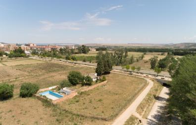 Imagen de terrenos donde se construirá el nuevo barrio, en la salida a Fontellas y hasta la Vía Verde del Tarazonica, en la parte inferior derecha de la imagen