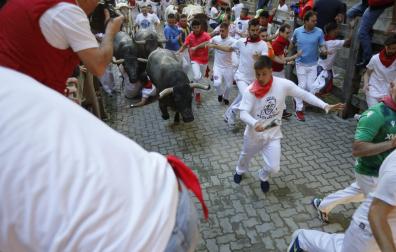 Imágenes del tercer encierro de San Fermín 2022