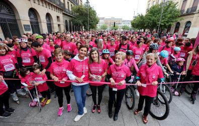 Fotos de la carrera solidaria de Saray en Pamplona. /