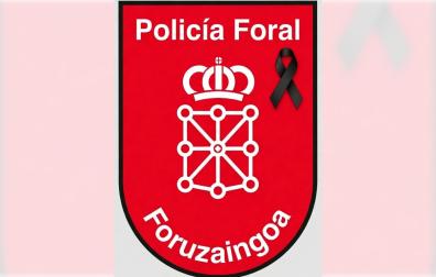 El escudo de la Policía Foral, con el crespón negro