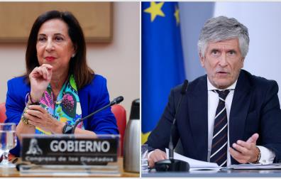 Margarita Robles y Fernando Grande-Marlaska, en sus comparecencias este 25 de agosto