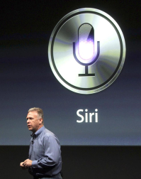 Imágenes de la presentación del último modelo del iPhone 4, de la marca Apple, este martes 4 de octubre.