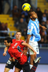 Imágenes del encuentro entre Osasuna y Málaga, disputado este domingo en el estadio de la Rosaleda.