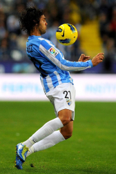 Imágenes del encuentro entre Osasuna y Málaga, disputado este domingo en el estadio de la Rosaleda.