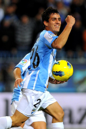 Imágenes del encuentro entre Osasuna y Málaga, disputado este domingo en el estadio de la Rosaleda.