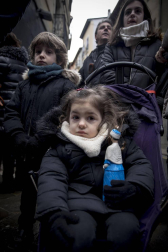 Imágenes del recorrido de los gigantes y cabezudos de Pamplona por San Saturnino