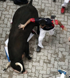 Imágenes del séptimo encierro de los Sanfermines de 2018, con toros de la ganadería Jandilla.